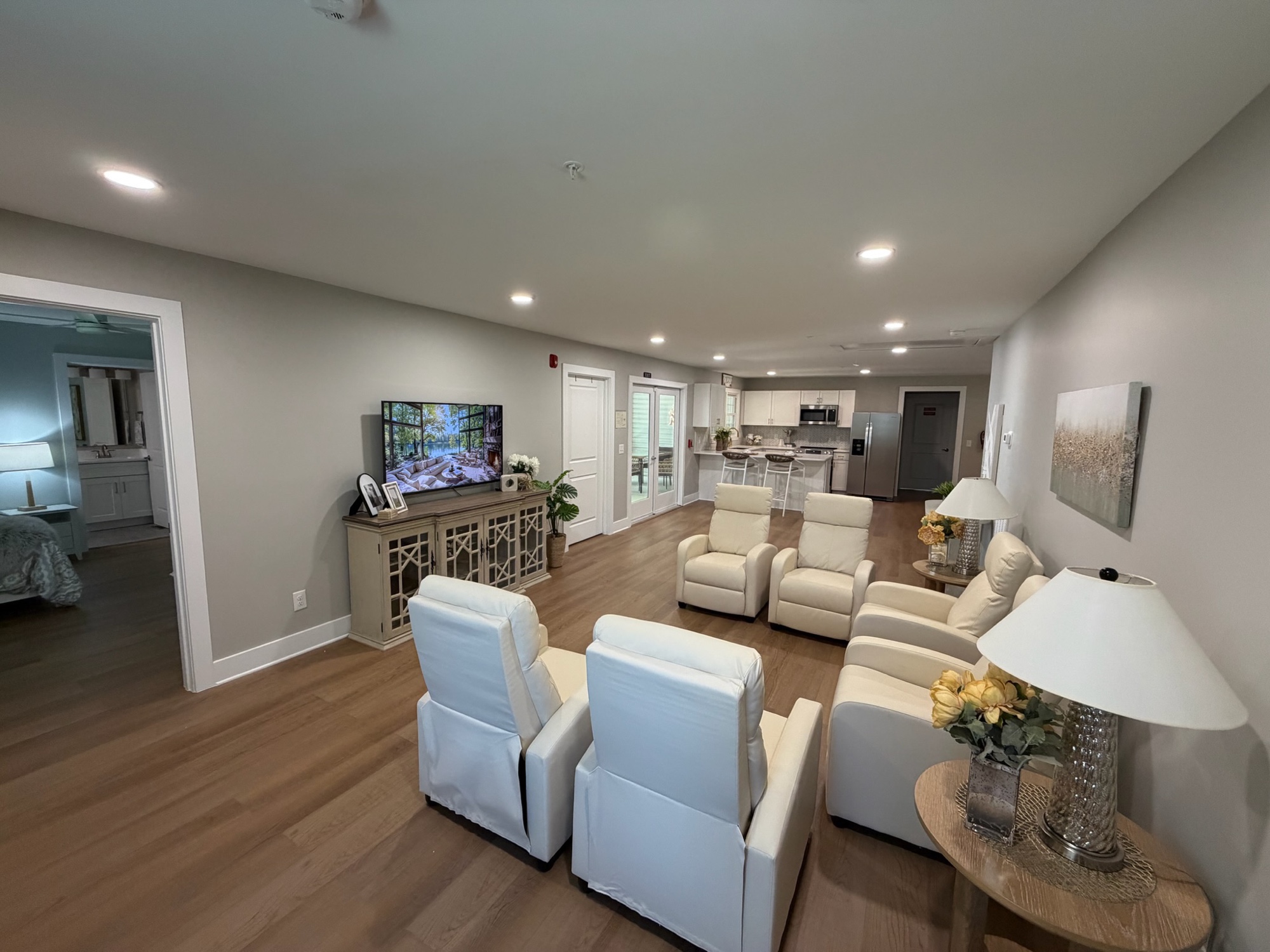 The open living room and kitchen at Picardy Pointe