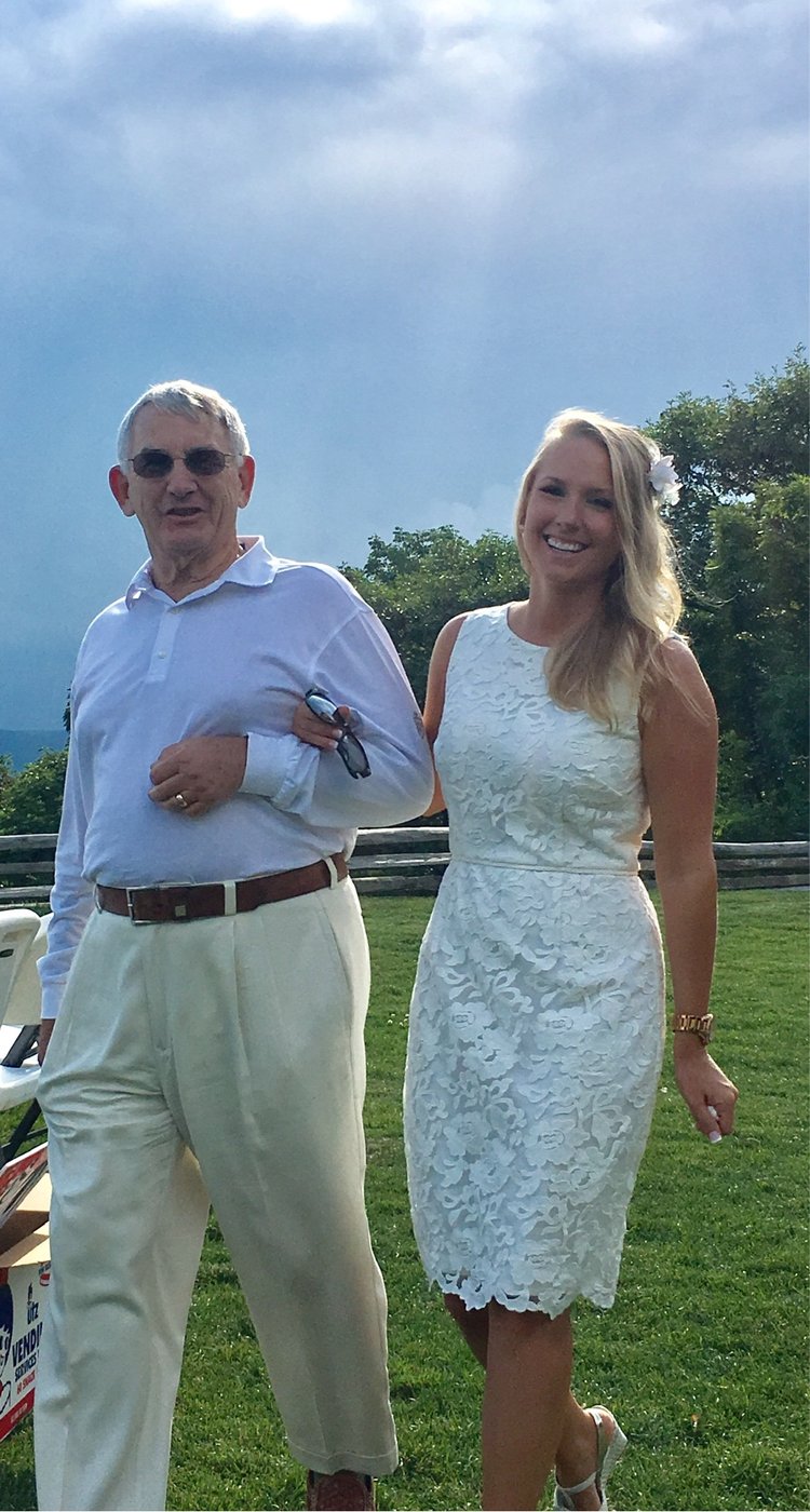 Melissa Rich standing arm-in-arm with her father, a United States Air Force veteran and business owner
